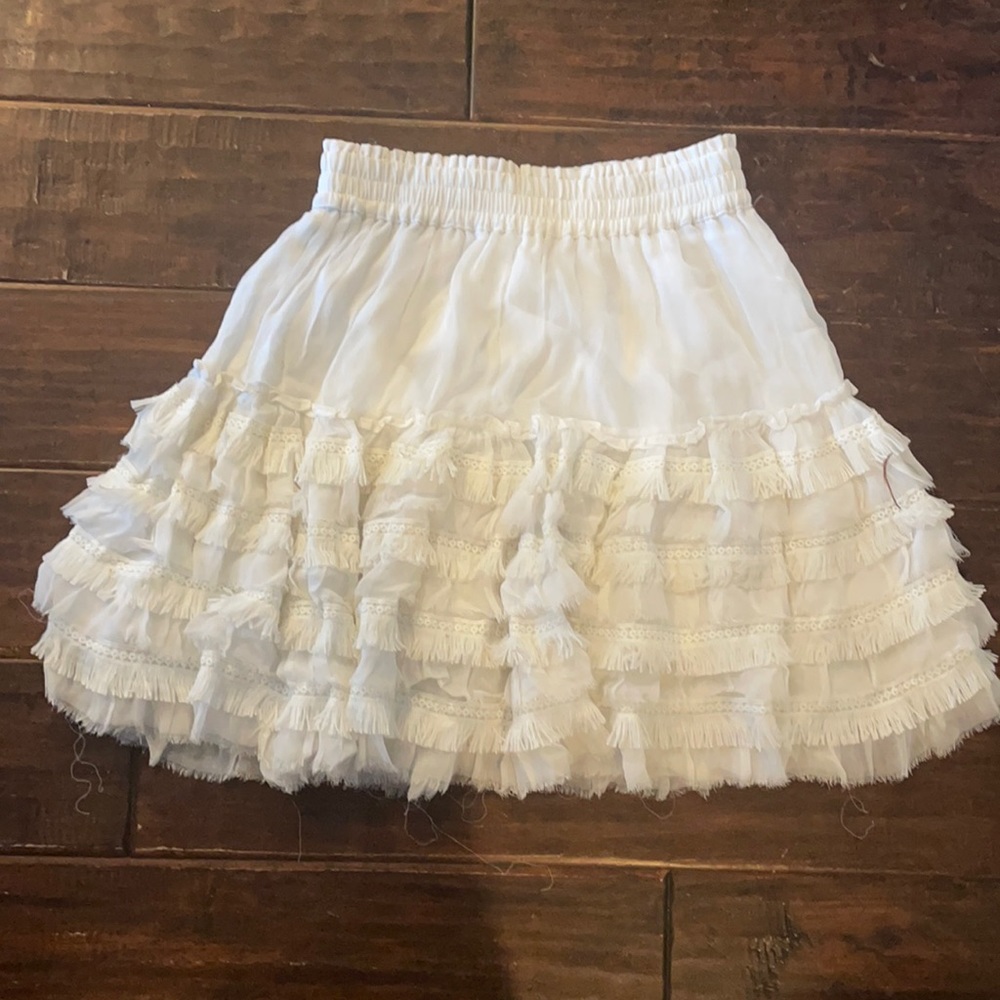 White ruffle with fringe skirt